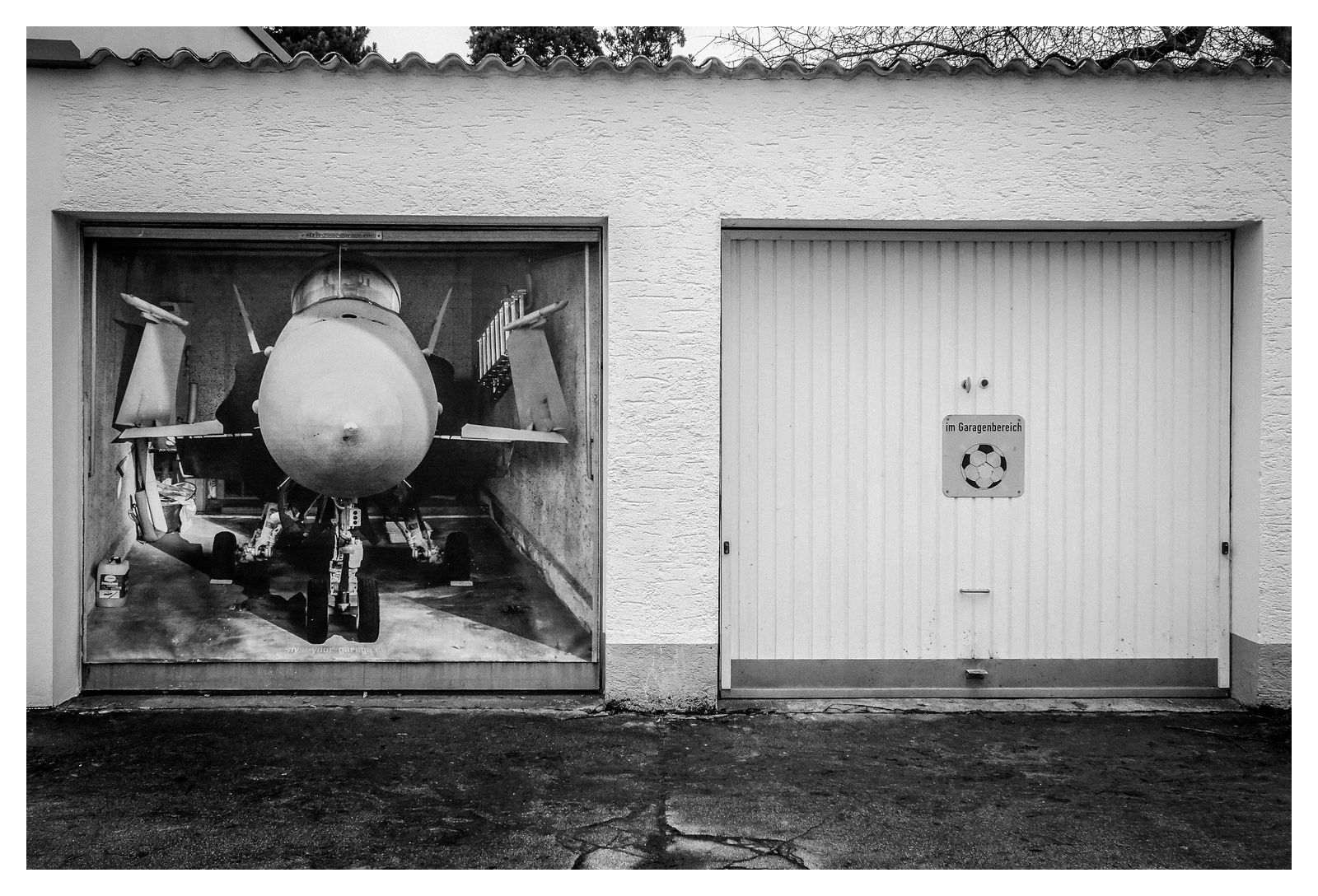 Optische Täuschung mit einem Garageposter